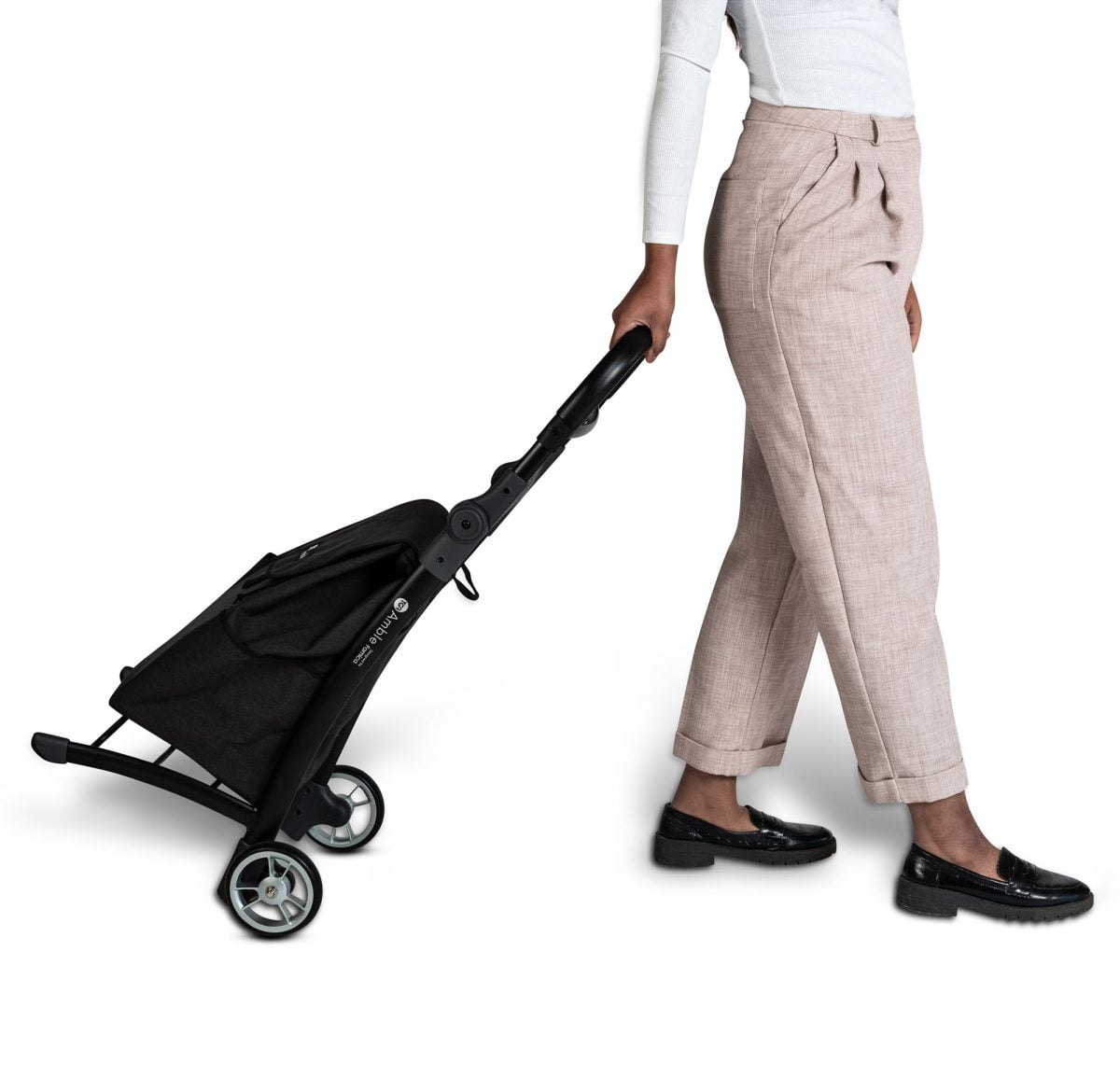 A person pulling a shopping trolley behind them